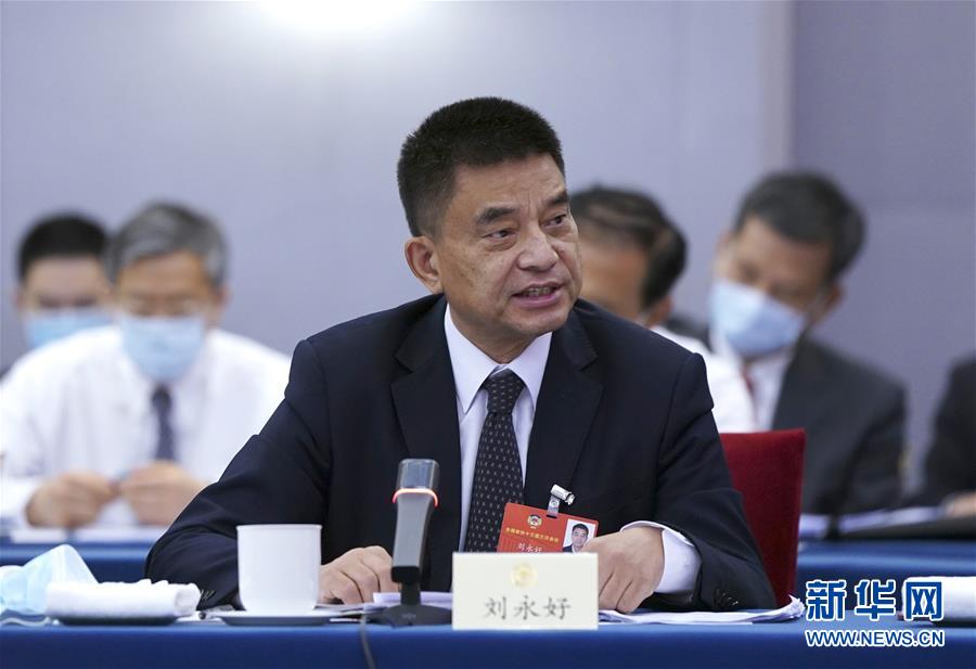 （兩會&middot;熱點(diǎn)畫報）（3）代表委員建言統(tǒng)籌做好經(jīng)濟(jì)社會發(fā)展工作