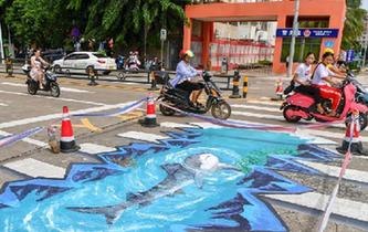 &ldquo;海洋世界&rdquo;3D立體斑馬線亮相?？? />  
<div>“海洋世界”3D立體斑馬線亮相海口</div>
</a> 
</div>
<div   id=