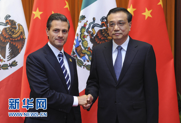 11月11日，國務院總理李克強在北京人民大會堂會見來華進行國事訪問并出席亞太經合組織第二十二次領導人非正式會議的墨西哥總統(tǒng)培尼亞。新華社記者張鐸 攝 